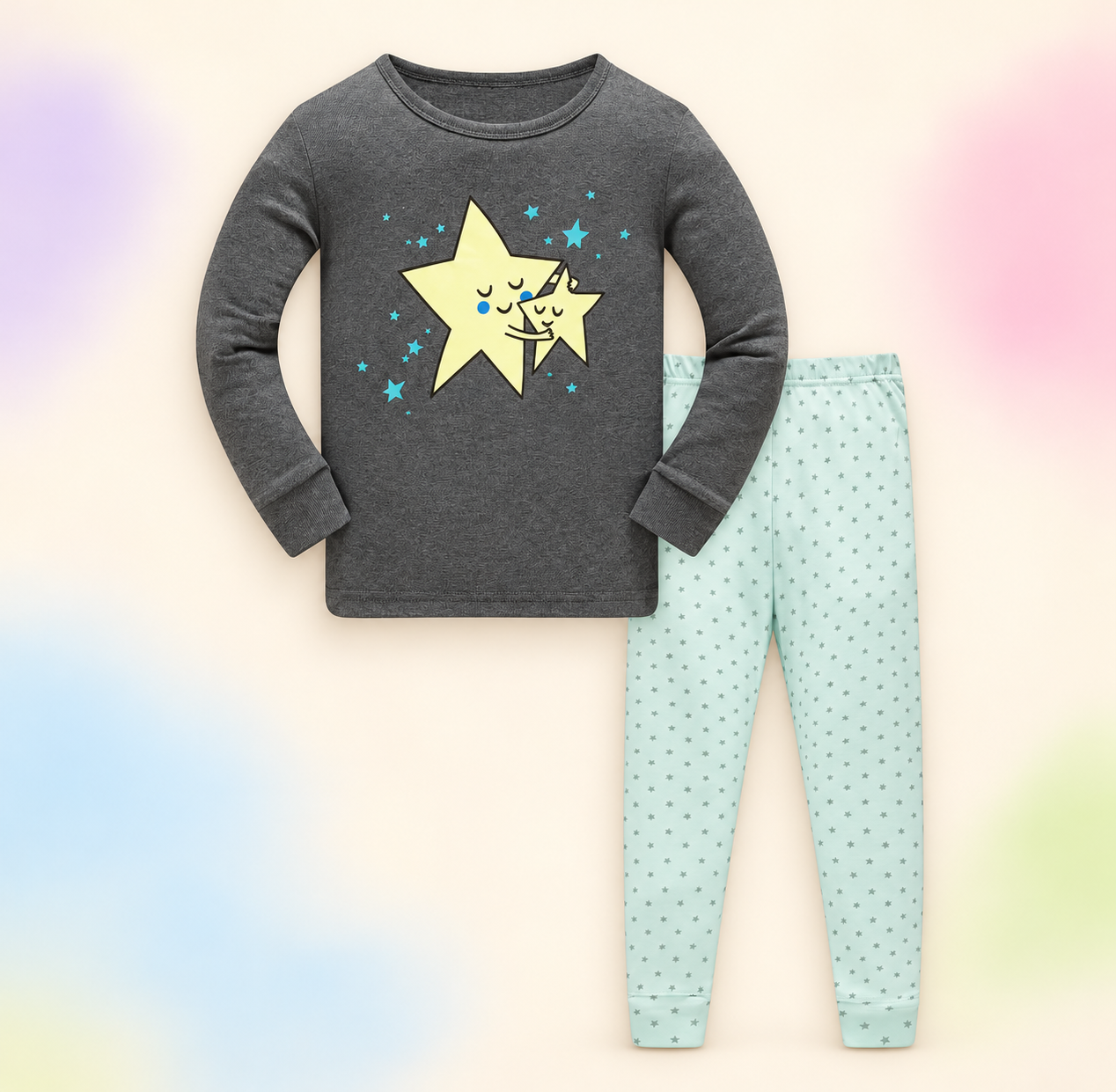 Charcoal and mint pajama set on a soft pastel branded studio background.